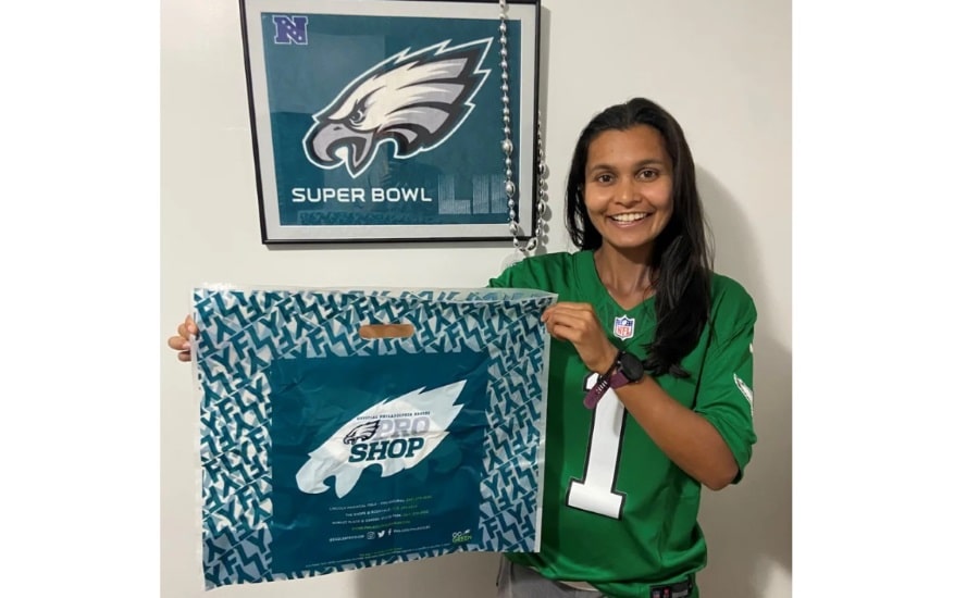 Phildelphia Eagles Fan Holding EcoShop Bag produced from Verde's PolyEarthylene