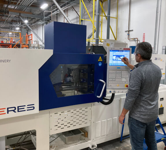 A Verde Bioresin worker using machinery